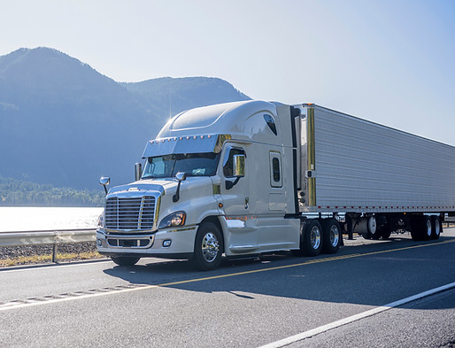 Truck Driving by Lake